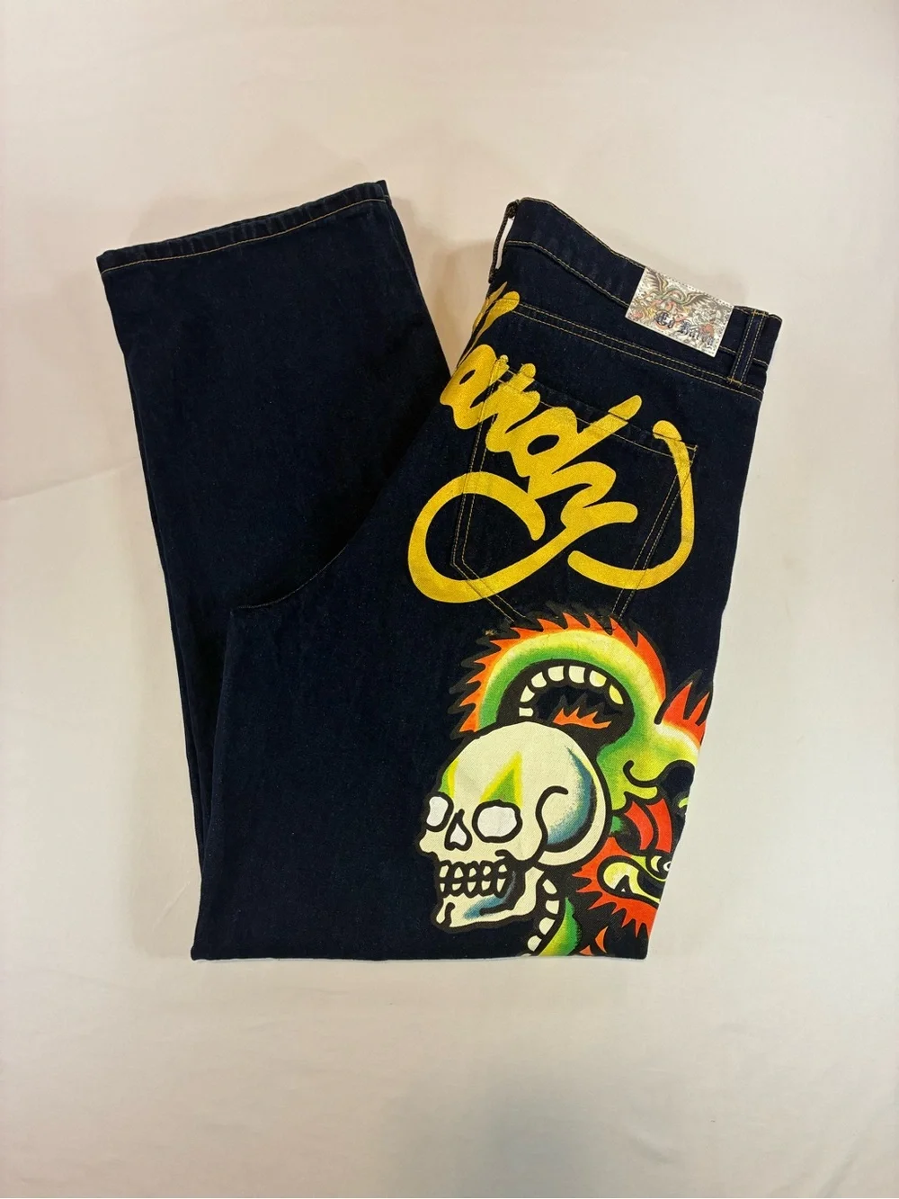 Ed Hardy Dark Blue Jeans with Yellow Script and Neon Skull Artwork